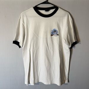 Classic White Tee with Blue Rose Accent